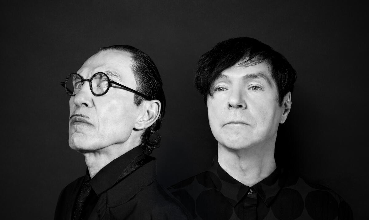 Portrait of brothers Ron and Russell Mael, both wearing all black