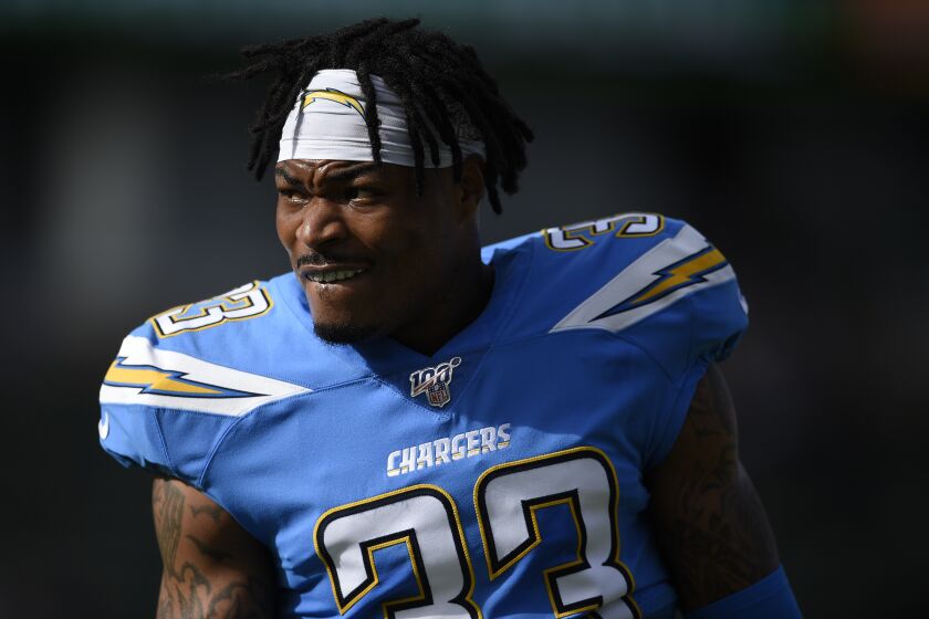 Los Angeles Chargers free safety Derwin James watches during warm ups before an NFL football game against the Oakland Raiders Sunday, Dec. 22, 2019, in Carson, Calif. (AP Photo/Kelvin Kuo)