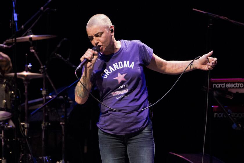 Sinead O'Connor sings onstage