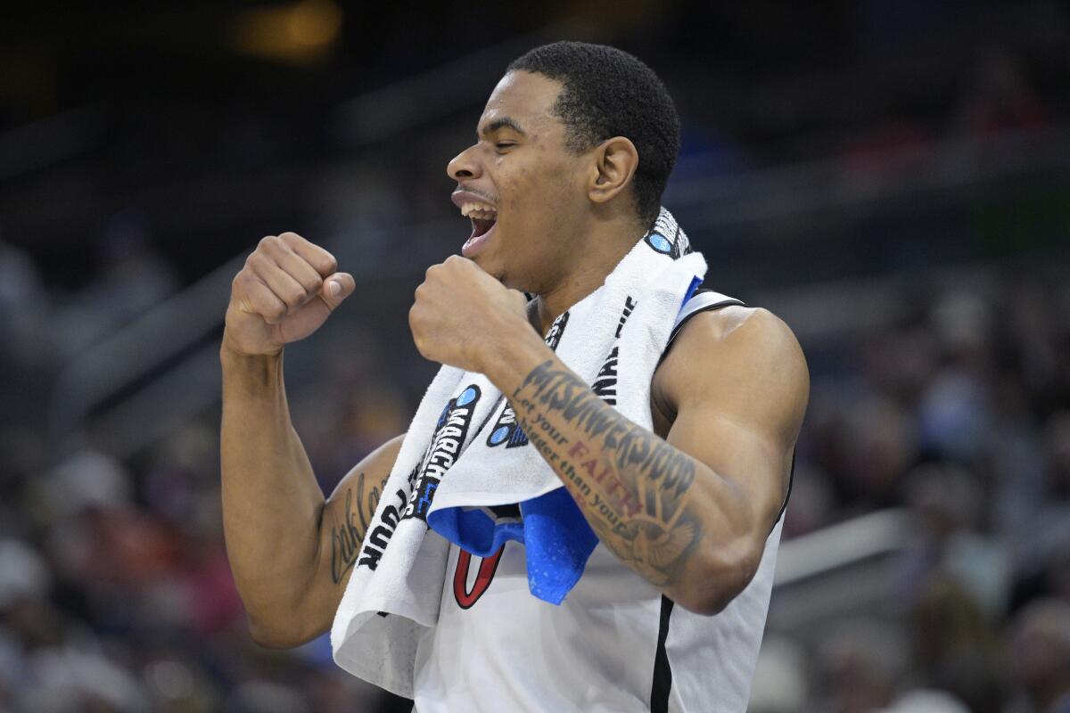 San Diego State forward Keshad Johnson celebrates during a second-round win over Furman on Saturday.