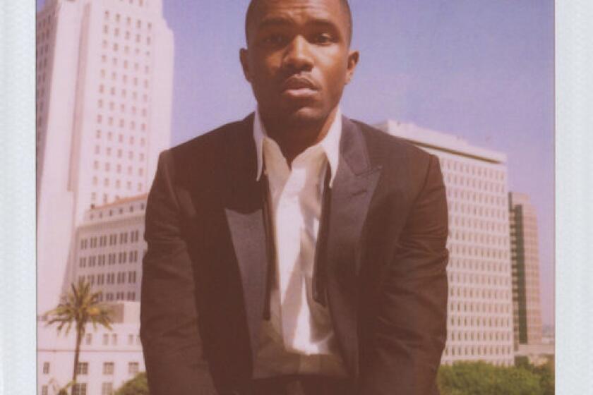 Singer and songwriter Frank Ocean was photographed at the Los Angeles Times building for the Band of Outsiders spring-summer 2013 campaign. City Hall is in the background.