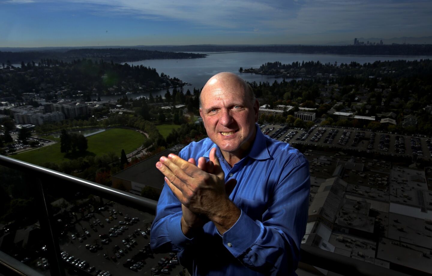 New Clippers owner Steve Ballmer on the balcony of his office in Bellevue, Wash., that overlooks Lake Washington.