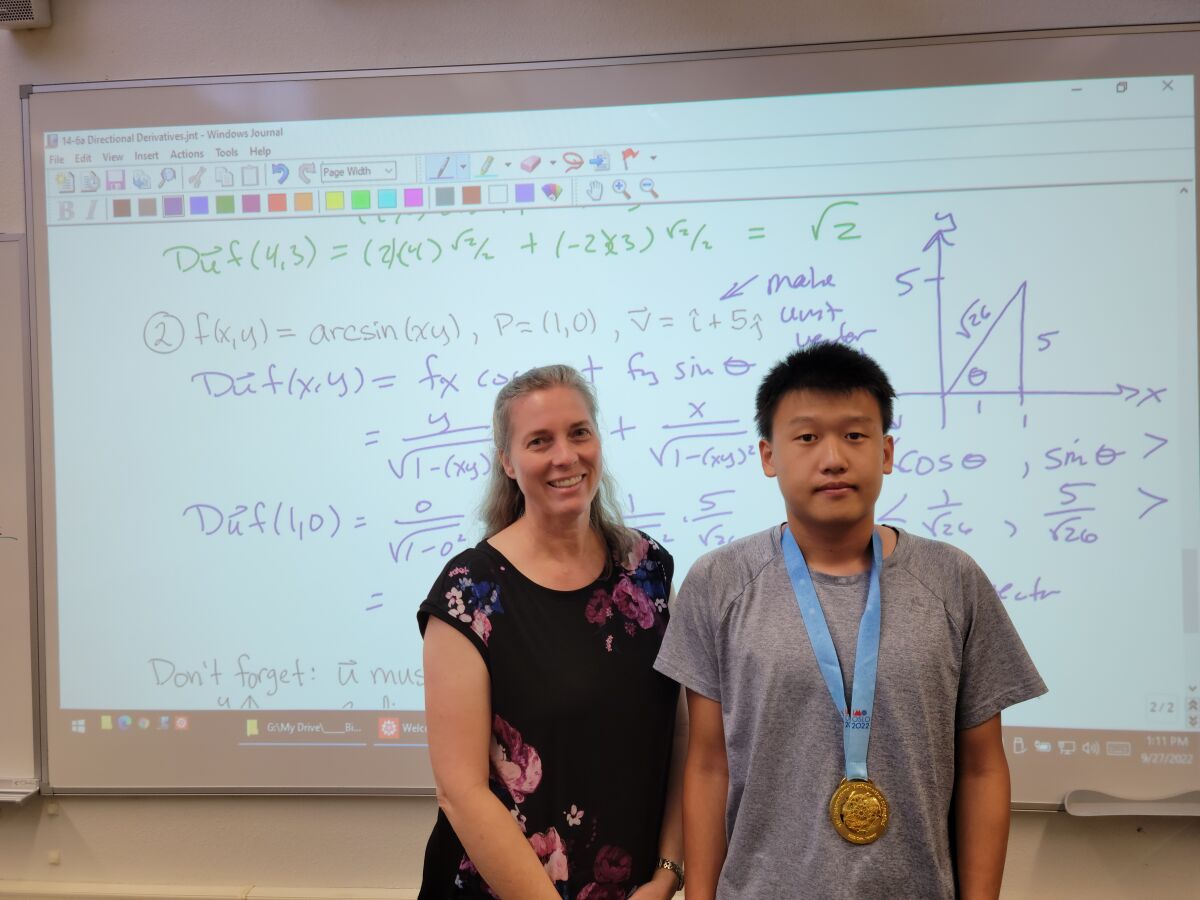 Math teacher Abby Brown with Derek Liu