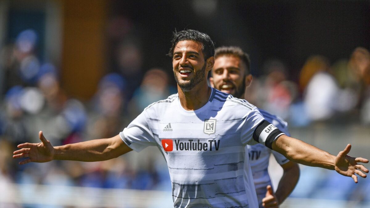 LAFC forward Carlos Vela celebrates after scoring one of his three goals against San Jose on March 30.