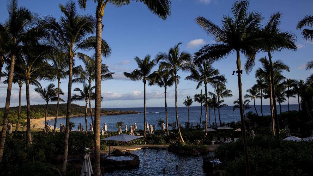 The central pool at Four Seasons on the island of Lanai where yoga and morning meditation comes with the room.