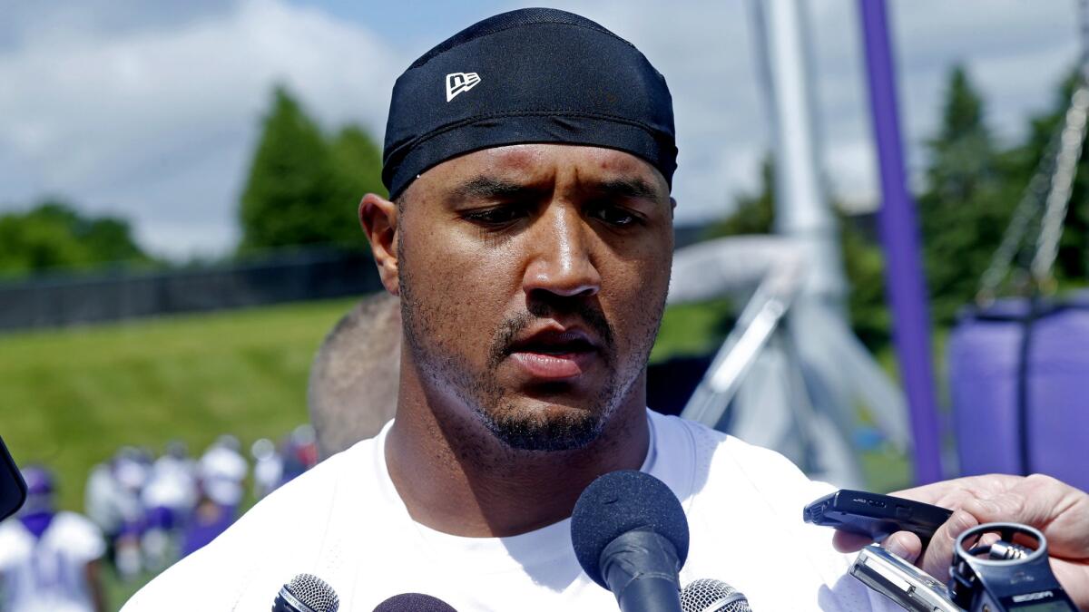 Vikings wide receiver Michael Floyd talks with reporters during organized team activities in May.