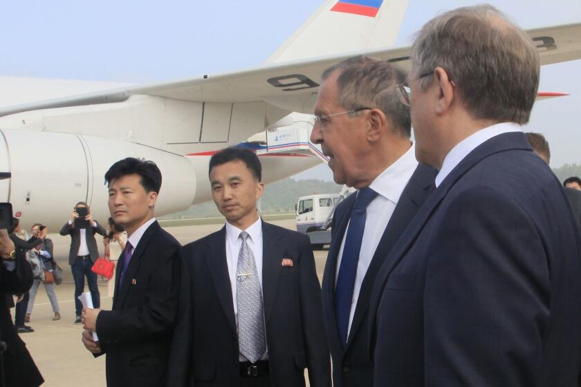 Russian Foreign Minister Sergey Lavrov, second right, and his delegation arrive at Pyongyang Airport, North Korea Thursday, May 31, 2018. Lavrov's visit comes ahead of a planned summit between President Donald Trump and North Korean leader Kim Jong Un and is seen as an attempt by Moscow to ensure its voice is heard in the North's diplomatic overtures with Washington, Seoul and Beijing. (AP Photo/Jon Chol Jin)