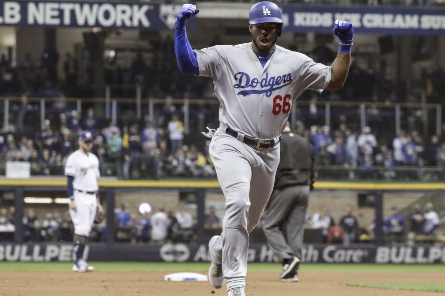 Dodgers Yasiel Puig celebrates after hitting a three run homerun in the 6th inning.