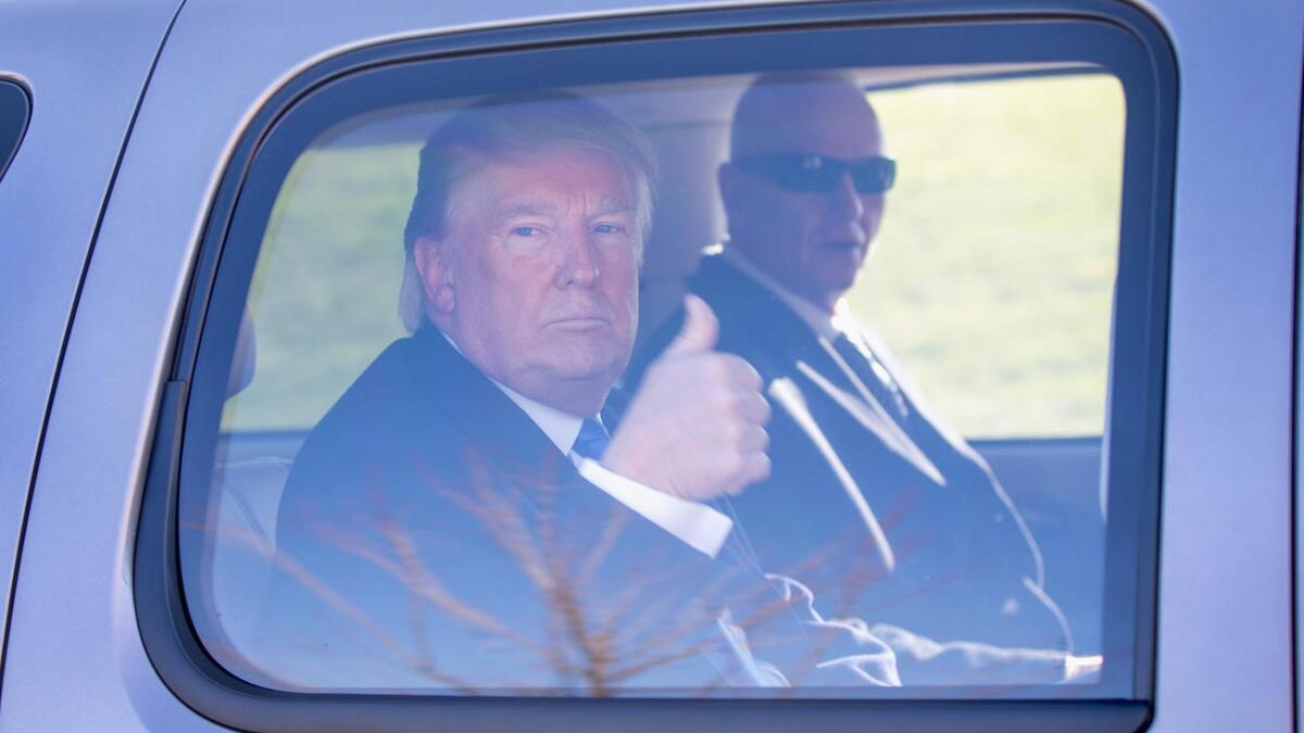 Donald Trump leaves a polling place at the Waukesha Fire Department in Wisconsin last week after meeting with voters and supporters.