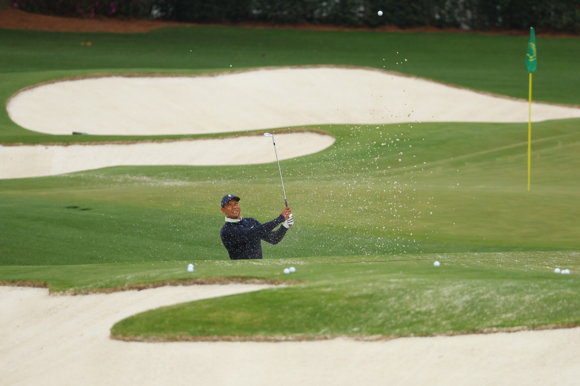 Tiger Woods swings a golf club