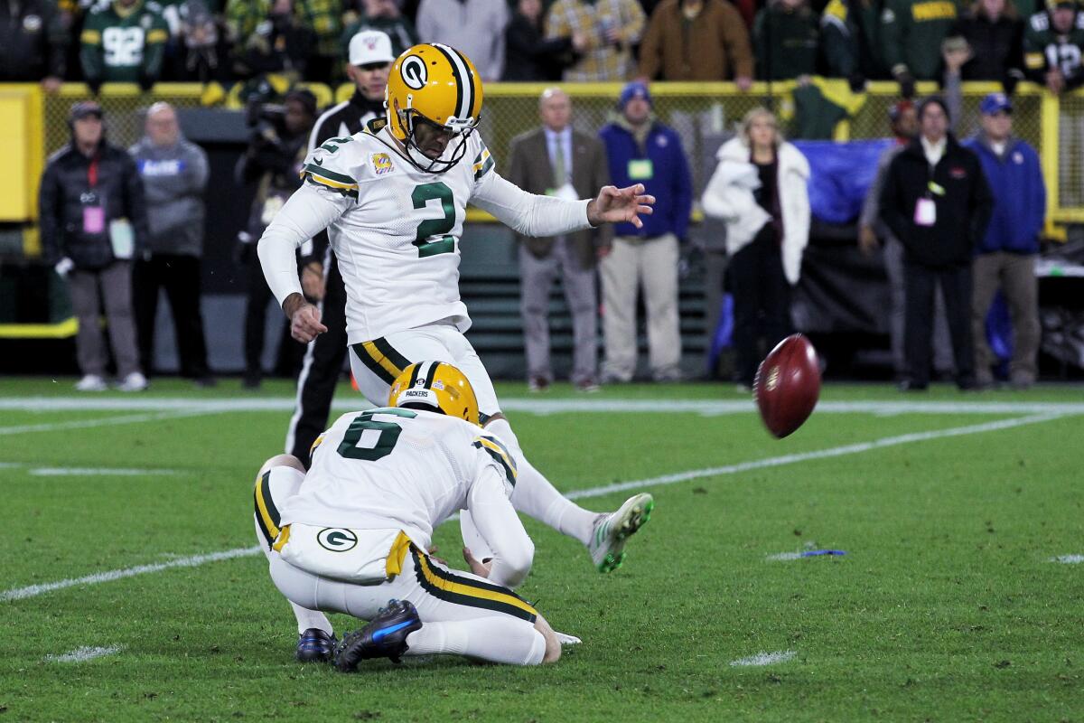 Green Bay kicker Mason Crosby converts on a field-goal attempt as time expires to lift the Packers over the Detroit Lions 23-22 on Monday.