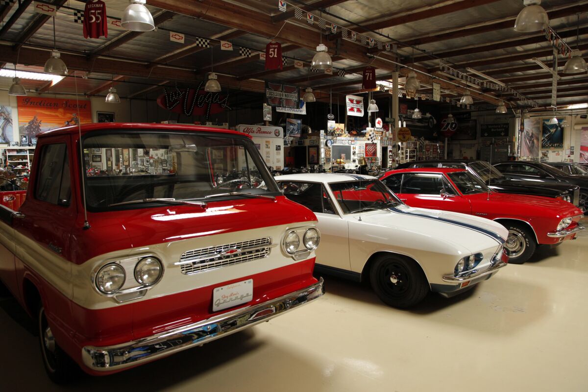 Various classic vehicles are part of the collection.