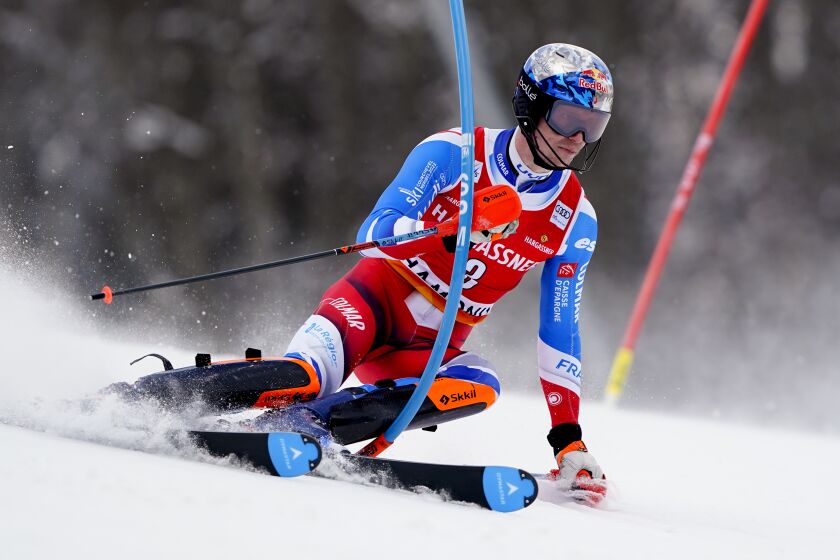 France's Clement Noel speeds down the course during an alpine ski, men's World Cup slalom in Chamonix, France, Saturday, Feb. 4, 2023. (AP Photo/Pier Marco Tacca)