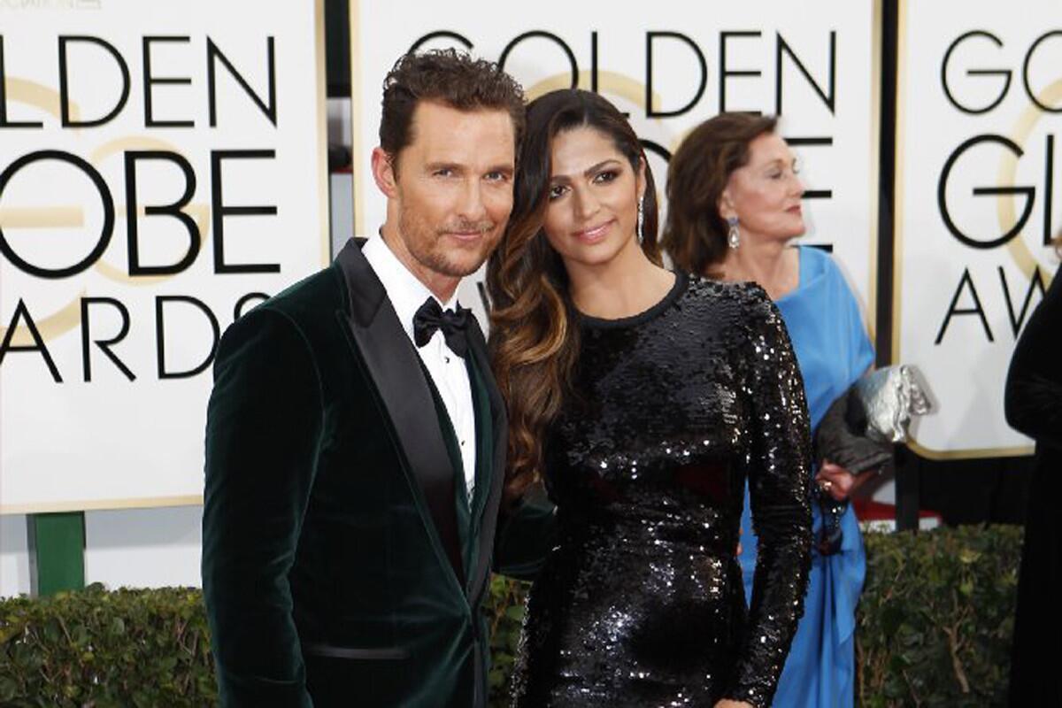Matthew McConaughey and Camila Alves arrive for the 71st Annual Golden Globe Awards show at the Beverly Hilton Hotel.