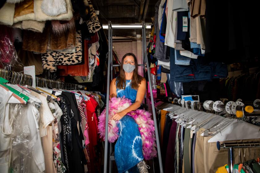 LOS ANGELES, CA - AUGUST 25: Costumer Lindsey Meyer Clough, who works primarily on commercials, is photographed in Cargo Costume, in South Central Los Angeles, CA, Tuesday, Aug. 25, 2020. Clough often finds clothing for her productions at Cargo Costume, among other costume houses and has been advocating for more enforcement of covid safety provisions on sets. (Jay L. Clendenin / Los Angeles Times)