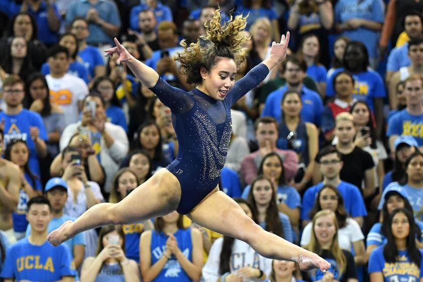 LOS ANGELES, CALIFORNIA MARCH 21, 2019-UCLA's Katelyn Ohashi gets a perfect score on the floor exercise during competition against Utah St. at Pauley Pavillion Sunday. (Wally Skalij/Los Angeles Times)