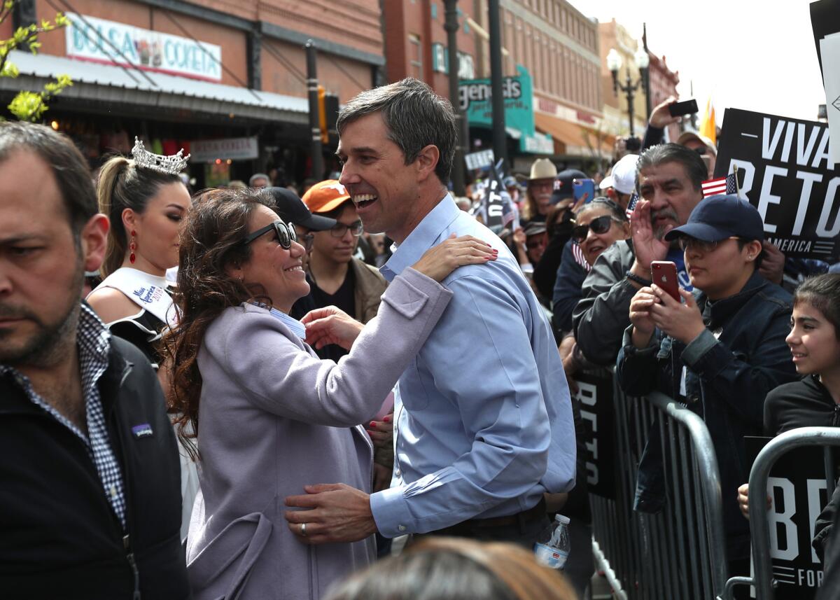 Democratic presidential hopeful Beto O'Rourke greets supporters during a campaign rally Saturday in his hometown of El Paso.