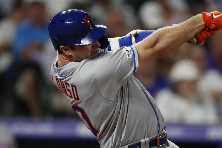 New York Mets first baseman Pete Alonso (20) in the fourth inning of a baseball game Monday, Sept. 16, 2019, in Denver. (AP Photo/David Zalubowski)