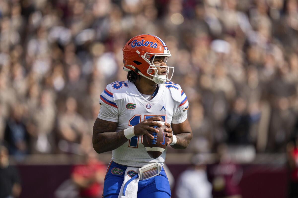 Florida quarterback Anthony Richardson (15) looks to pass against Texas A&M during the first quarter of an NCAA college football game Saturday, Nov. 5, 2022, in College Station, Texas. (AP Photo/Sam Craft)