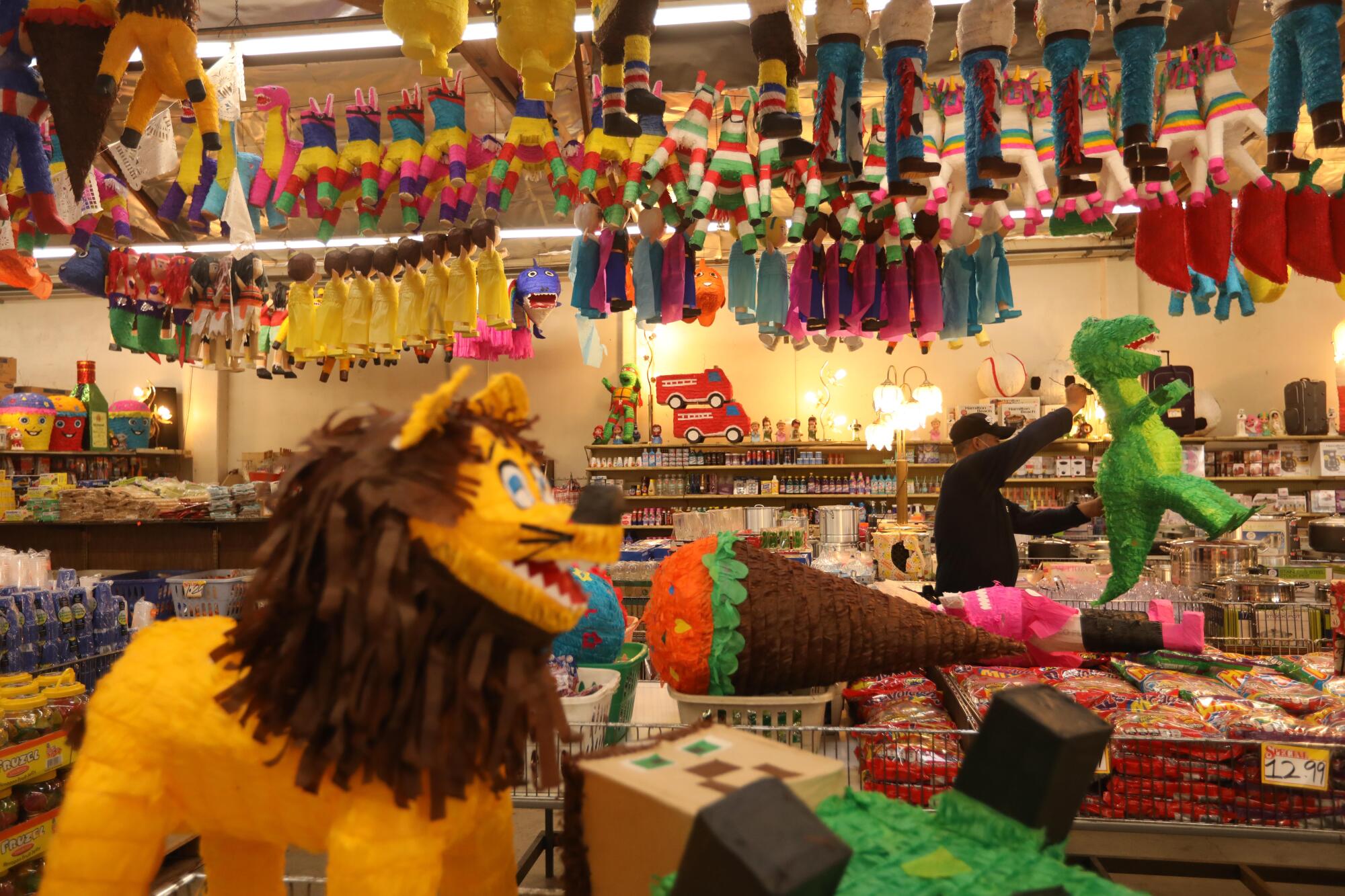 Pinatas inside a party supply store. 