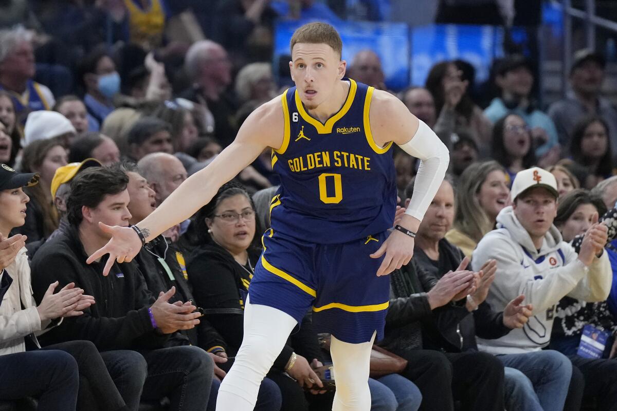 Photos: Donte DiVincenzo's Journey to the Warriors Photo Gallery