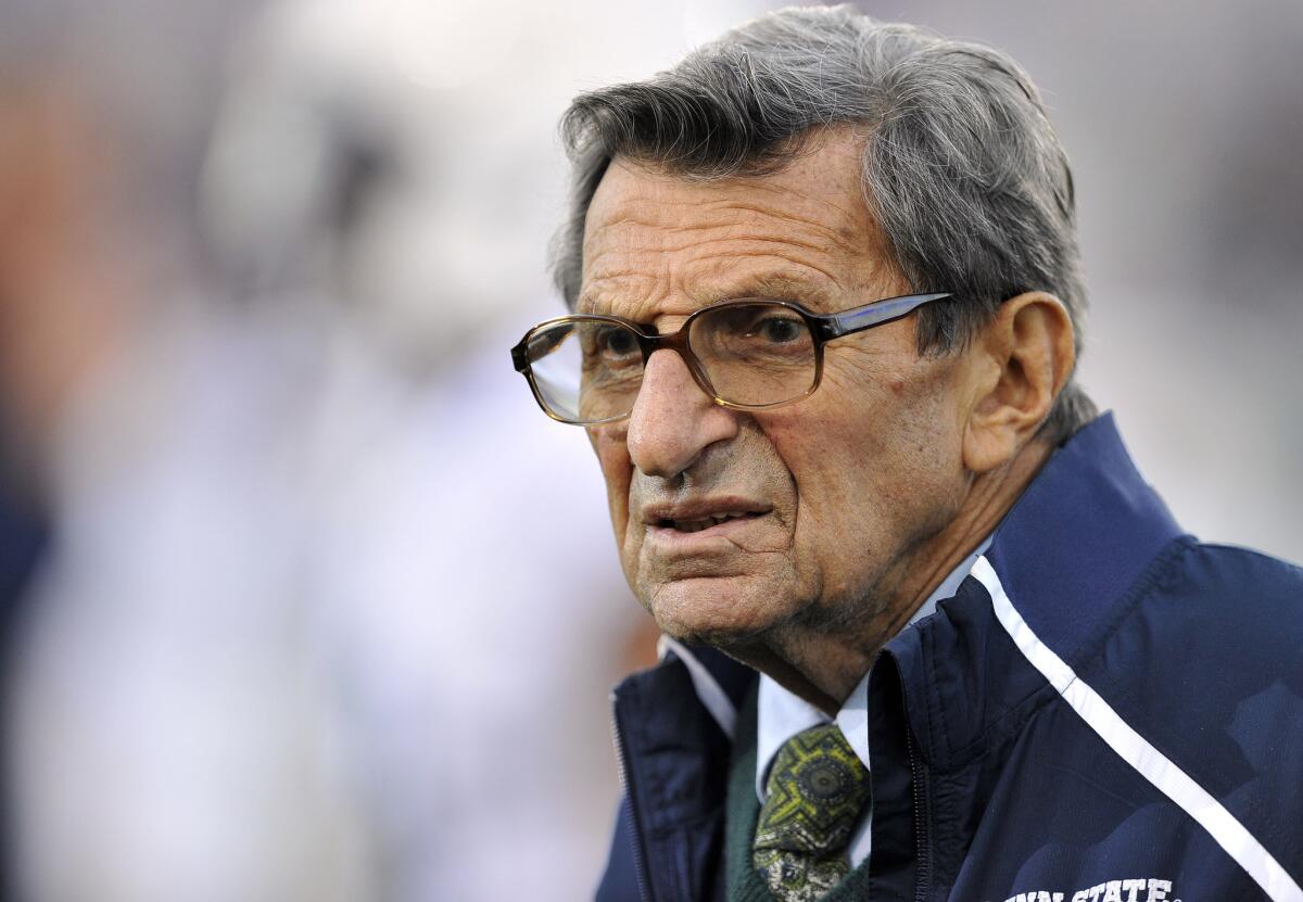 Penn State Coach Joe Paterno at a game in October 2011. he was fired that November after he was caught up in the Jerry Sandusky child sexual abuse case.