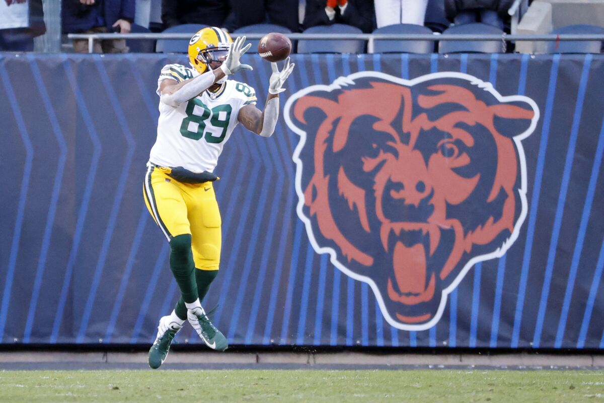 Packers tight end Marcedes Lewis makes a catch for a two-point conversion against the Bears during a game last season.