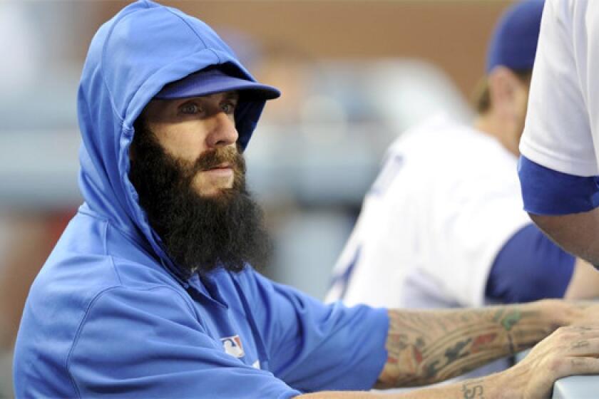 The Dodgers activated reliever Brian Wilson from the disabled-list on Tuesday while optioning Paco Rodriguez to triple-A Albuquerque.