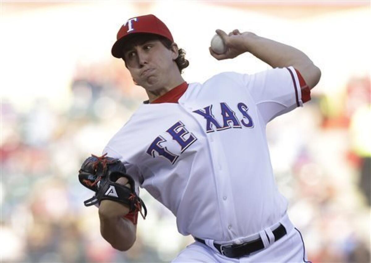 This is a 2013 photo of Derek Holland of the Texas Rangers