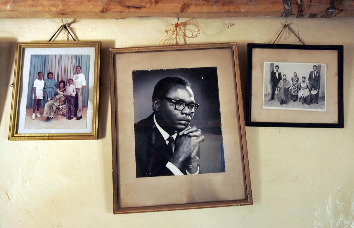 A photograph of Barack Obama Sr. hangs on the wall of Sarah Hussein Obama's house in the village of Kogelo, near the shores of Lake Victoria, Kenya.