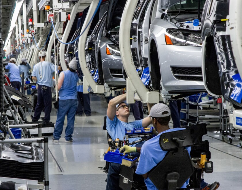 Workers assemble Volkswagen Passat sedans at the German automaker's plant in Chattanooga, Tenn. Workers at the plant will decide in a three-day vote starting Wednesday whether they want to be represented by the United Auto Workers.