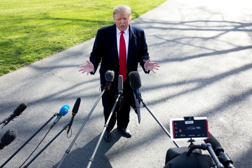 Mandatory Credit: Photo by MICHAEL REYNOLDS/EPA-EFE/REX (10181037g) US President Donald J. Trump responds to questions from members of the news media, on the South Lawn of the White House before departing by Marine One, in Washington, DC, USA, 28 March 2019. Trump travels to Grand Rapids, Michigan, to hold his first rally since Special Counsel Robert Mueller concluded his report on the investigation into Russian interference in the 2016 election. US President Donald J. Trump, Washington, USA - 28 Mar 2019 ** Usable by LA, CT and MoD ONLY **