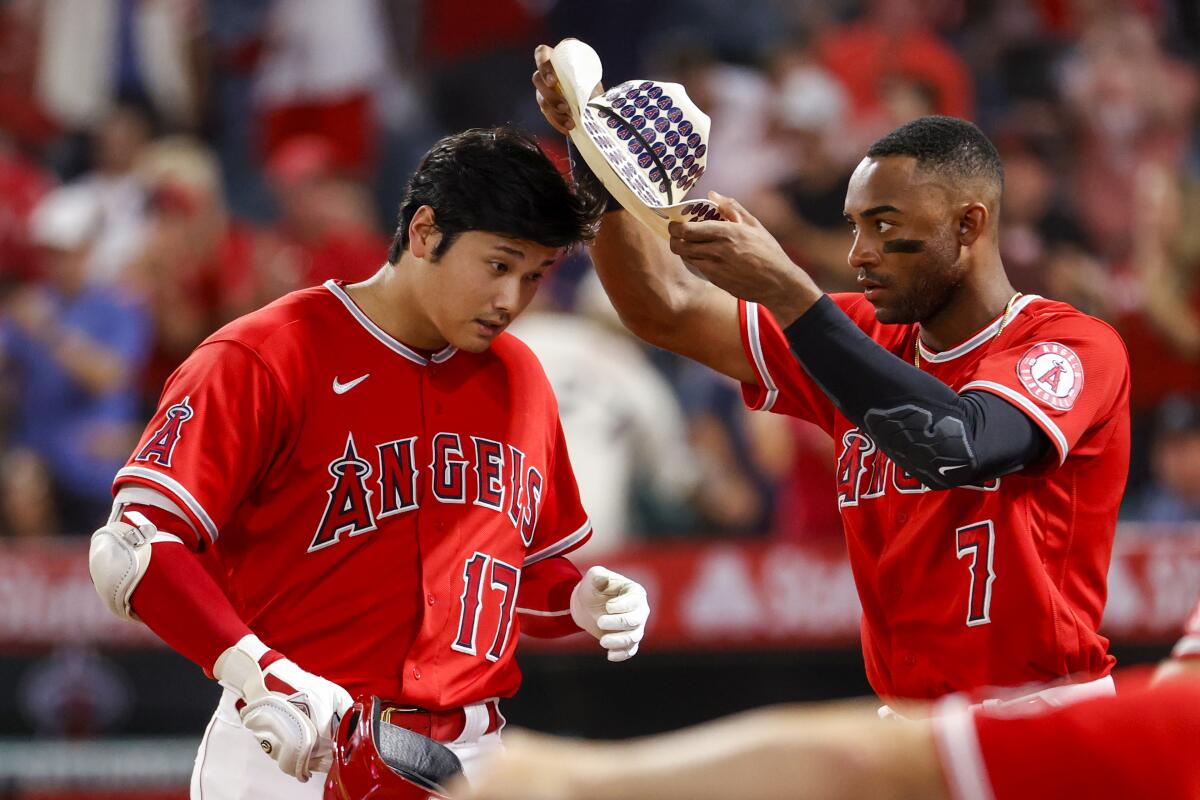 Ohtani strikes out his Angel teammate Mike Trout for the final out