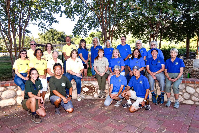 Docents and volunteers from Blue Sky Ecological Preserve and the Kumeyaay Ipai Interpretive Center gathered with Annie Ransom for a group portrait that was presented to her at her 9/15/22 retirement reception.