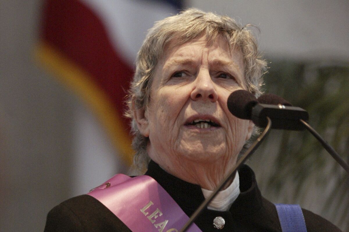 FILE—Peg Rosenfield, of the Ohio League of Women Voters, speaks during a news conference at the Statehouse in Columbus, Ohio in this file photo from Dec. 6, 2005. An obituary for Rosenfield, a long-time voting rights activist, reported she died March 11, 2022. the day her last letter to the editor ran in a local newspaper. She was 90. (AP Photo/Will Shilling, File)