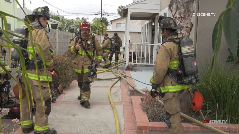 San Diego firefighters battled flames Wednesday morning inside a North Park apartment complex.