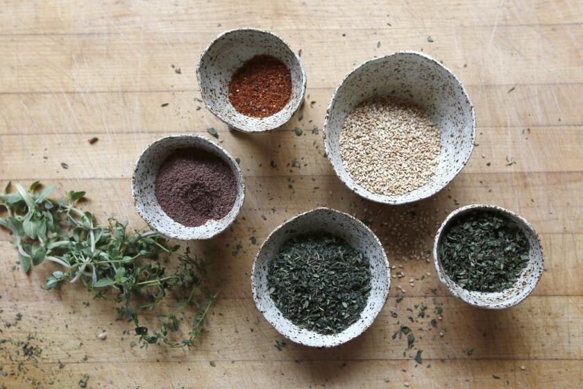 Jeanne Kelley has ingredients ready to make za'atar.