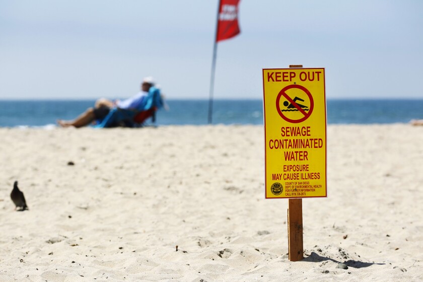 Signs barring swimming at Imperial Beach were up Monday after last weekâs rains flushed sewage and contaminated soil from the Tijuana River into the ocean. The beaches were declared safe for swimming by the county later in the day. K.C. Alfred â¢ U-T