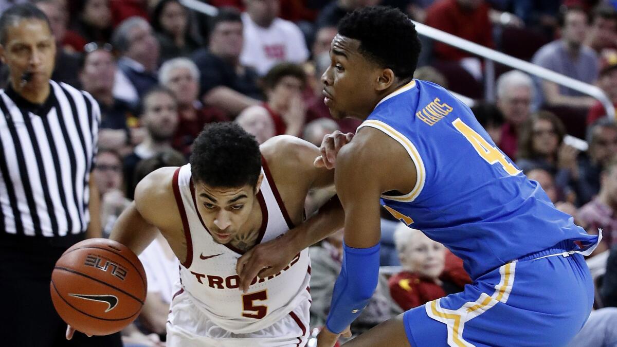 USC guard Derryck Thornton drives to the basket against UCLA guard Jaylen Hands in the second half Jan. 19 at Galen Center.