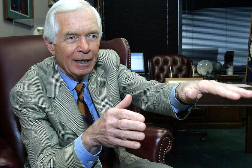 FILE - In this Aug. 24, 2005, file photo, U.S. Sen. Thad Cochran, R-Miss., speaks to a reporter in Jackson, Miss. Seven-term Republican Sen. Thad Cochran, who used seniority to steer billions of dollars to his home state of Mississippi, died Thursday, May 30, 2019. He was 81. (AP Photo/Rogelio Solis, File)