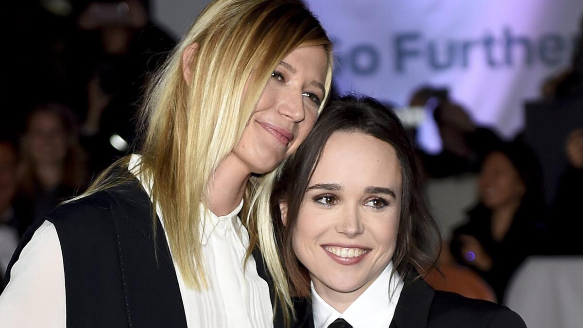 Ellen Page, right, walked the red carpet at the Toronto International Film Festival premiere of "Freehald" with her artist-girlfriend Samantha Thomas on Sunday.
