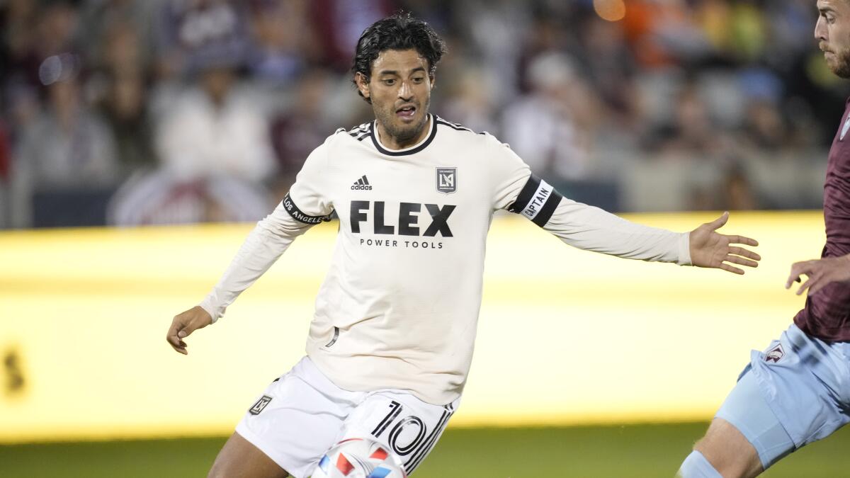 LAFC forward Carlos Vela chases the ball against the Colorado Rapids.