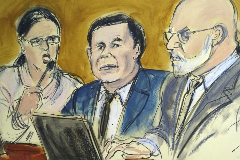 In this courtroom drawing, Joaquin "El Chapo" Guzman, center, sits at the defense table while listening to Judge Brian Cogan addressing the jury, Thursday, Feb. 7, 2019, during Guzman's drug trafficking trial in New York. Jurors ended their first week of deliberations on Thursday without reaching a verdict. From left are an interpreter, Guzman and defense attorney Eduardo Balarezo.(Elizabeth Williams via AP)