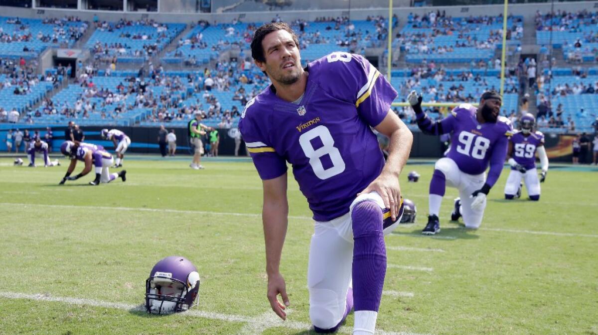 Vikings quarterback Sam Bradford stretches before a game against the Panthers on Oct. 22.