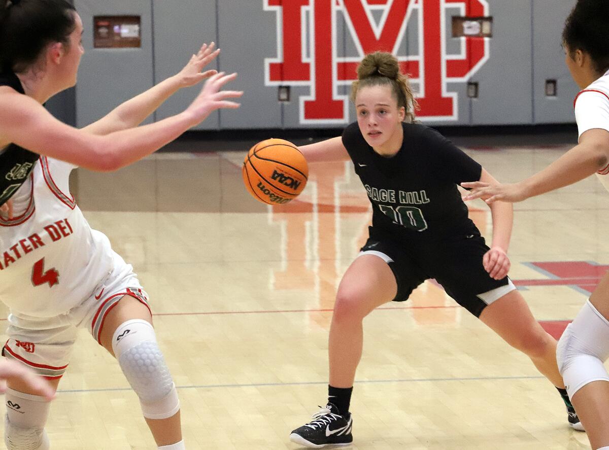 Sage Hill's Amalia Holguin (10) looks for an open player against Mater Dei in the Matt Denning Nike Hoops Classic.