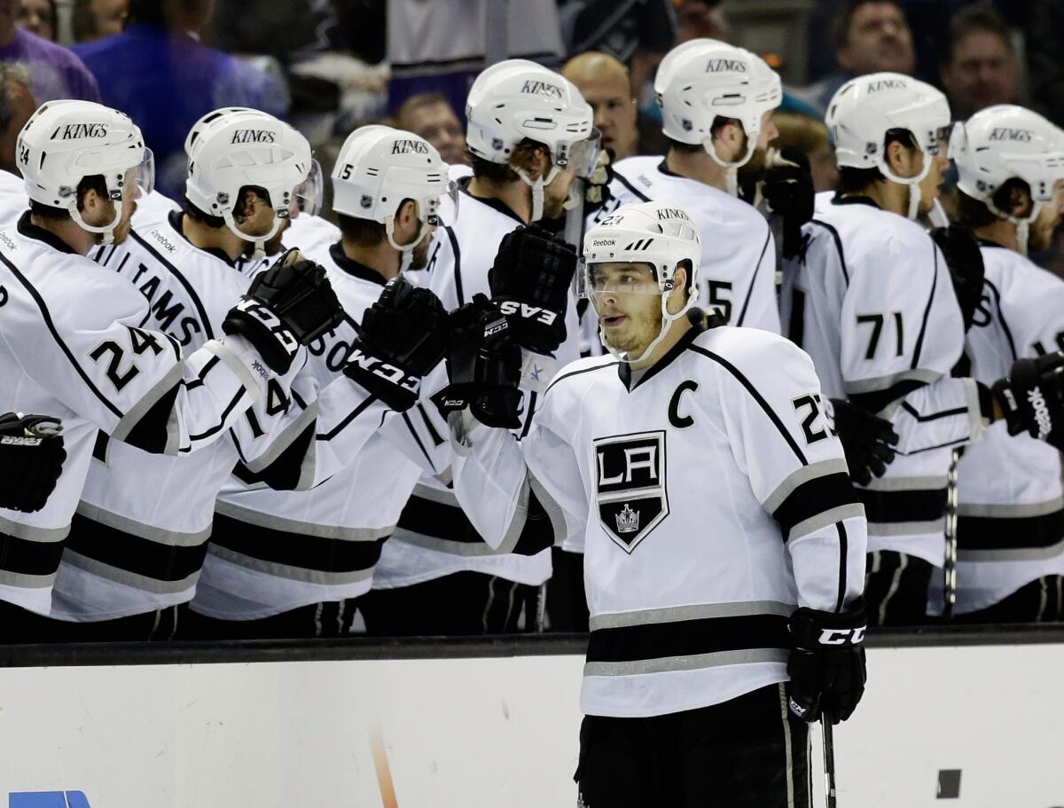 Kings captain Dustin Brown signed on for another eight years with the team Thursday.