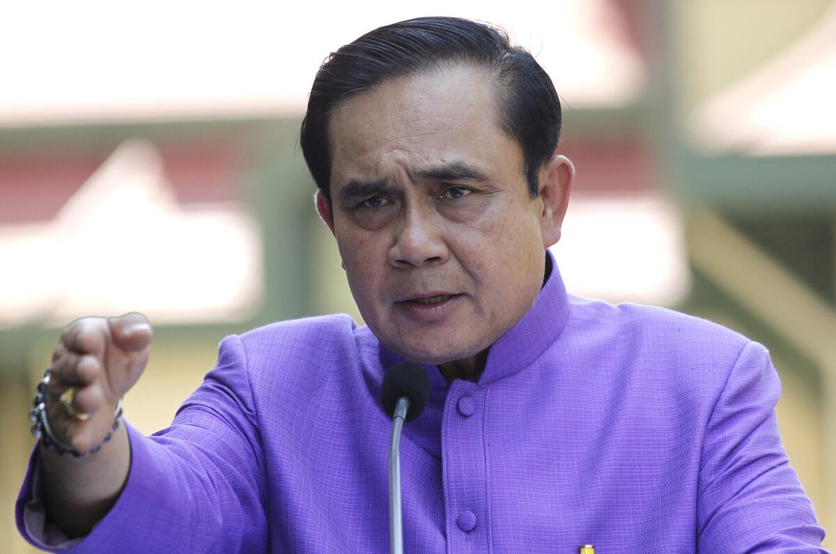 Thailand's Prime Minister Prayuth Chan-ocha at a press conference in Bangkok on Tuesday, when he announced that he was seeking to replace martial law with sweeping new powers for the junta he leads.