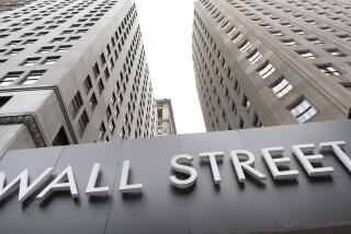FILE - In this Aug. 31, 2020 file photo, buildings line Wall Street, in New York. Stocks are opening higher on Wall Street Thursday, Sept. 10 as the market claws back some more of the ground it lost in a three-day slump that snapped a day earlier. (AP Photo/Mark Lennihan, File)