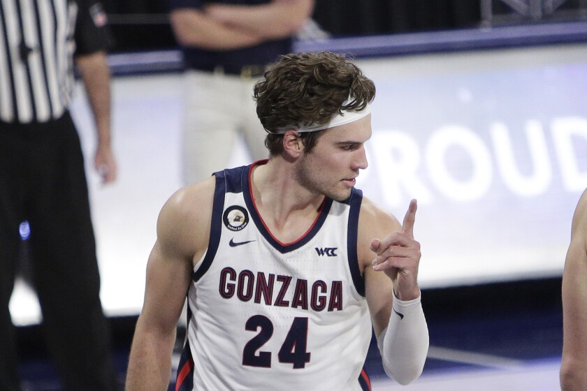 Gonzaga forward Corey Kispert gestures after scoring a basket during the second half of the team's NCAA college basketball game against BYU in Spokane, Wash., Thursday, Jan. 7, 2021. (AP Photo/Young Kwak)