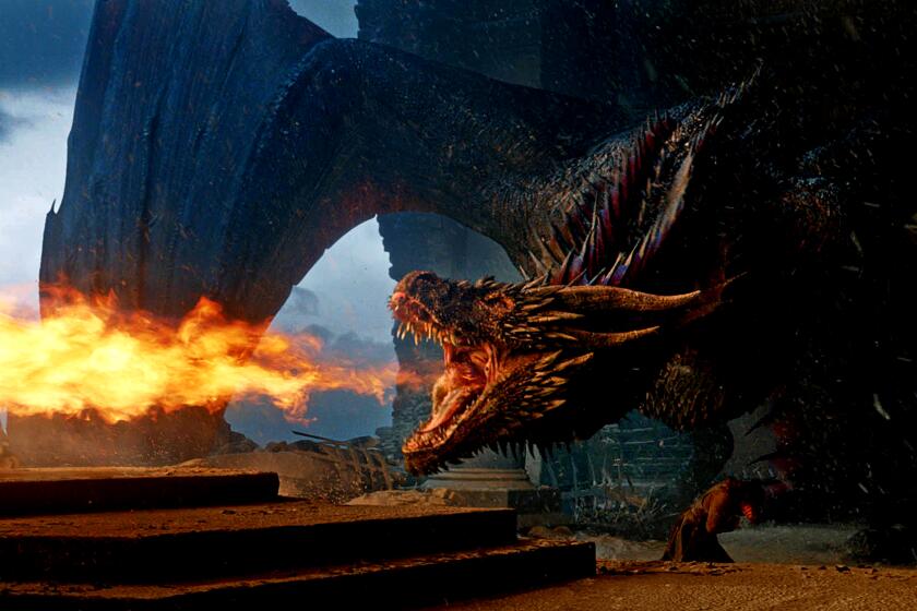 Drogon melts the Iron Throne in the finale of the HBO series, "Game of Thrones." (HBO/TNS) ** OUTS - ELSENT, FPG, TCN - OUTS **